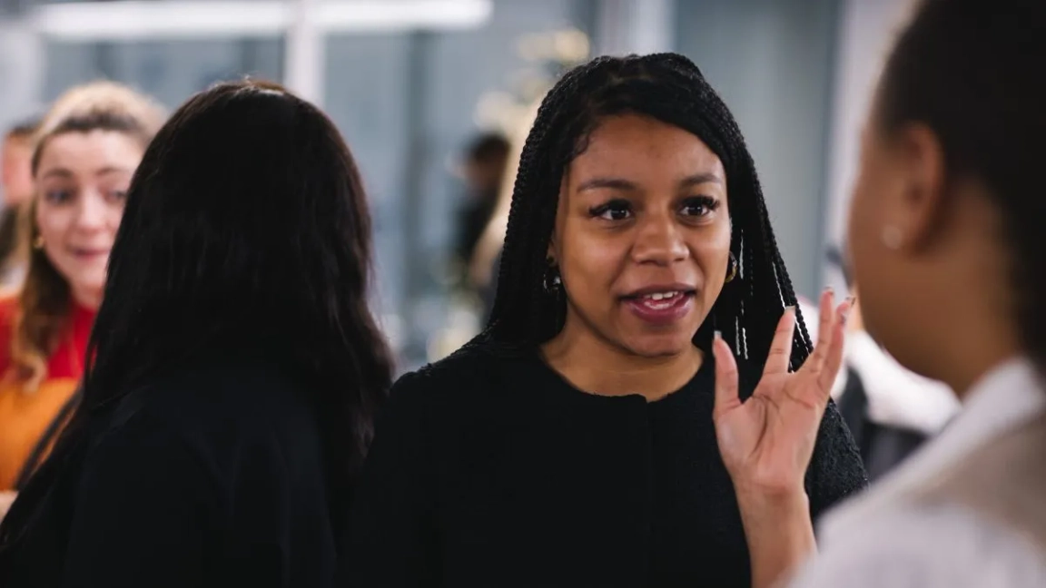 women speaking to each other 